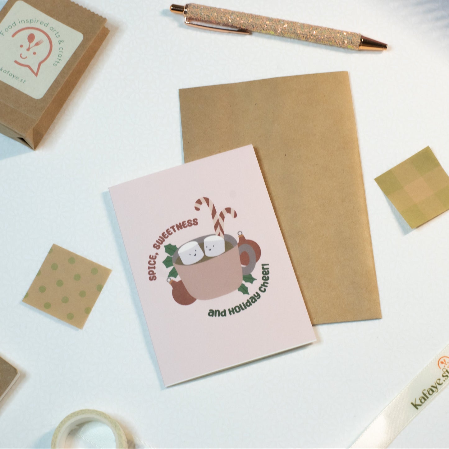 Holiday Greeting card and stationery items on a light surface