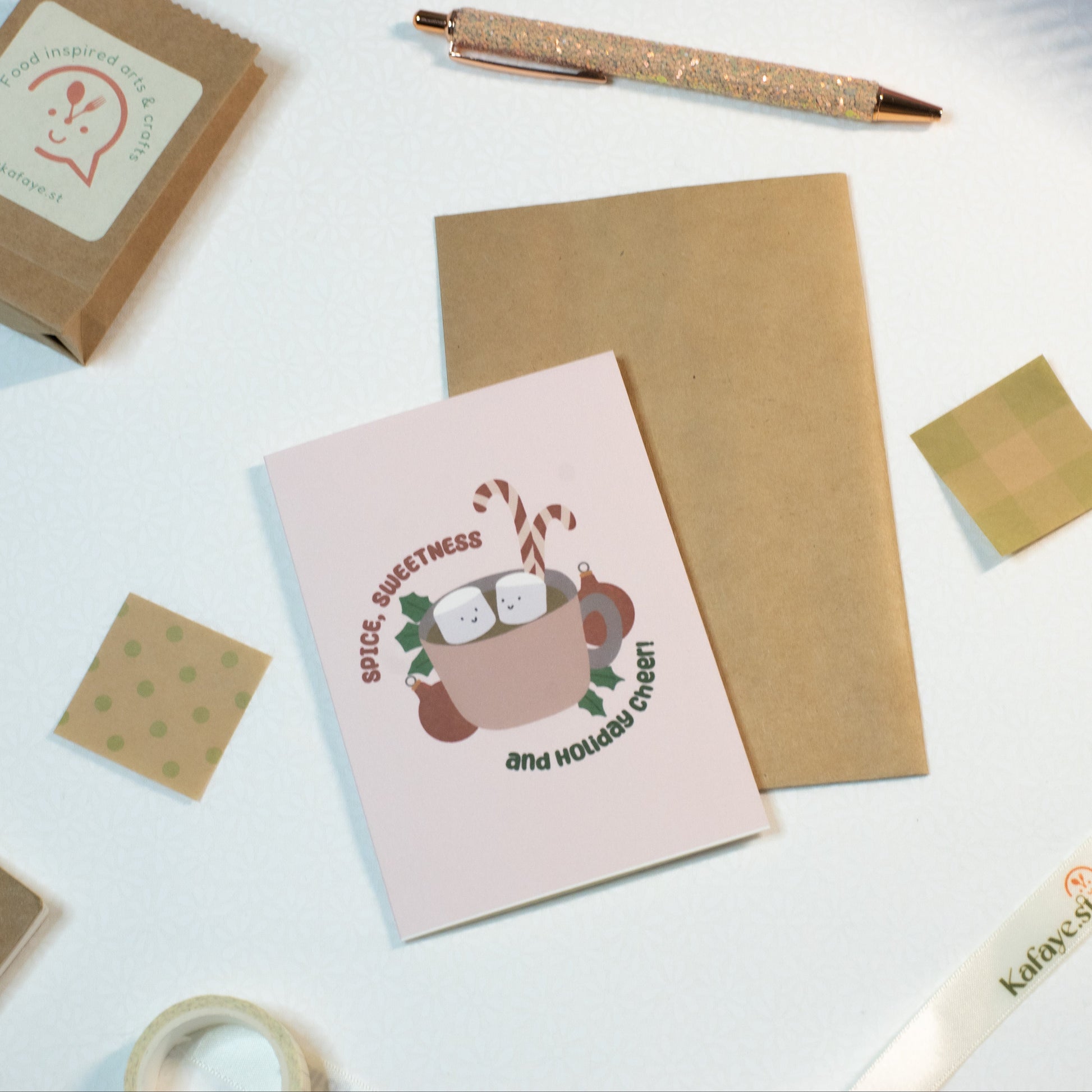 Holiday Greeting card and stationery items on a light surface